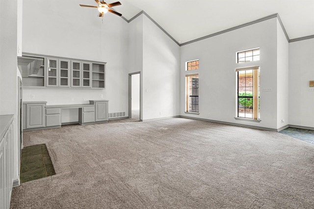 1407 W Mulberry St, Sherman, TX 75092 - unfurnished living room with high vaulted ceiling, light carpet, ornamental molding, a ceiling fan, and baseboards