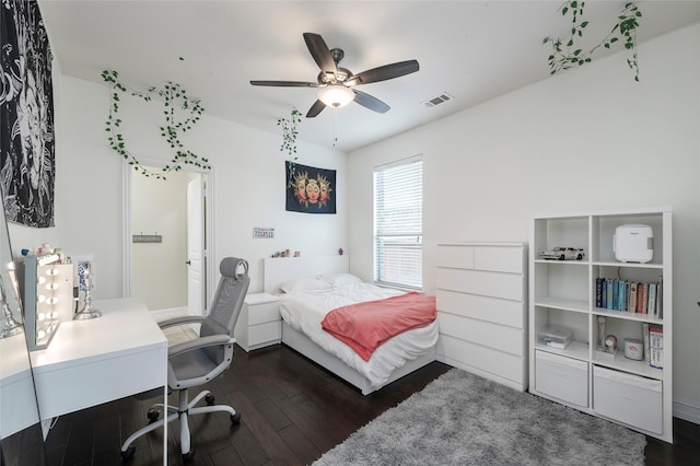 4416 Berry Ridge Ln, Frisco, TX 75036 - bedroom featuring dark wood-style flooring, an office area, a ceiling fan, and baseboards