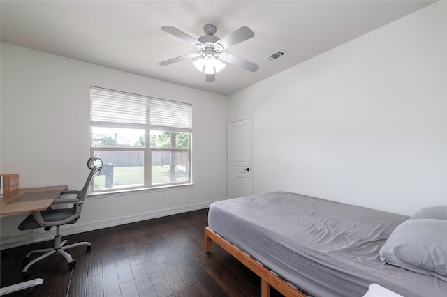4416 Berry Ridge Ln, Frisco, TX 75036 - bedroom with baseboards, dark wood-style flooring, a desk, and a ceiling fan