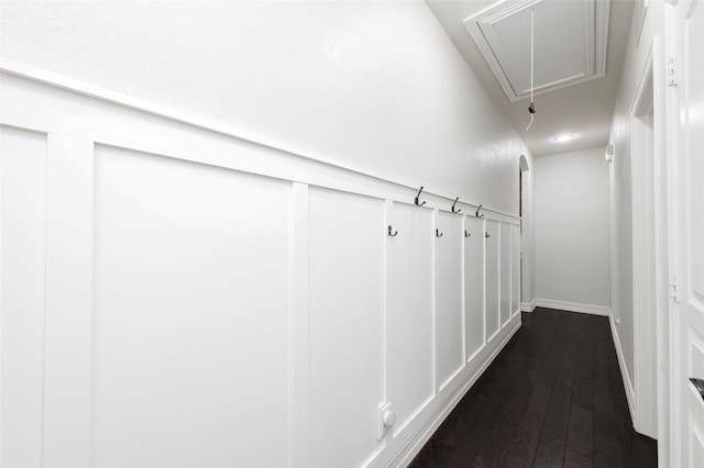 4416 Berry Ridge Ln, Frisco, TX 75036 - hallway with attic access, dark wood-type flooring, and baseboards