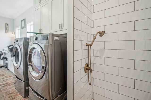 6170 Green Meadow Ln, Terrell, TX 75160 - washroom featuring washer and clothes dryer, cabinet space, brick flooring, and crown molding