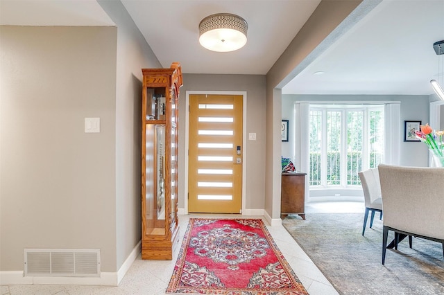 foyer with baseboards