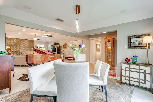 dining area featuring a ceiling fan