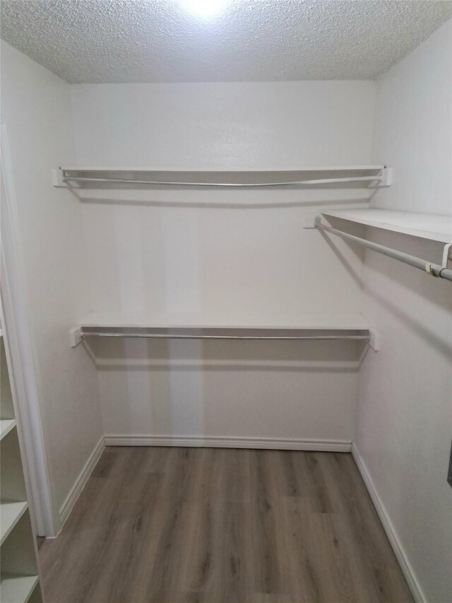 327 Trevino Trl, Lancaster, TX 75146 - spacious closet featuring wood finished floors