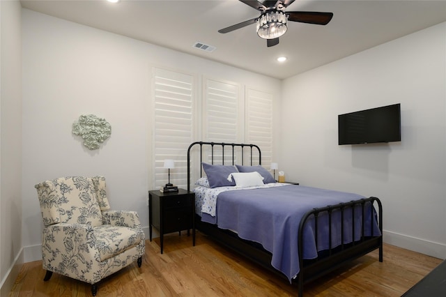 105 Shawnee Trl, Pottsboro, TX 75076 - bedroom with baseboards, wood finished floors, recessed lighting, and a ceiling fan
