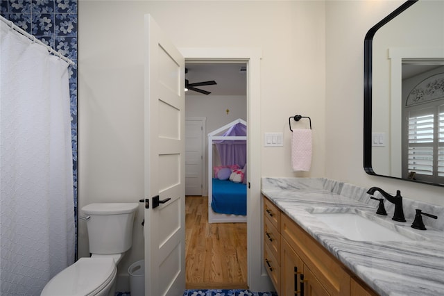105 Shawnee Trl, Pottsboro, TX 75076 - full bath featuring wood finished floors, vanity, and toilet