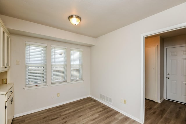 5304 Weddington Ct, Fort Worth, TX 76133 - unfurnished dining area with wood finished floors and baseboards