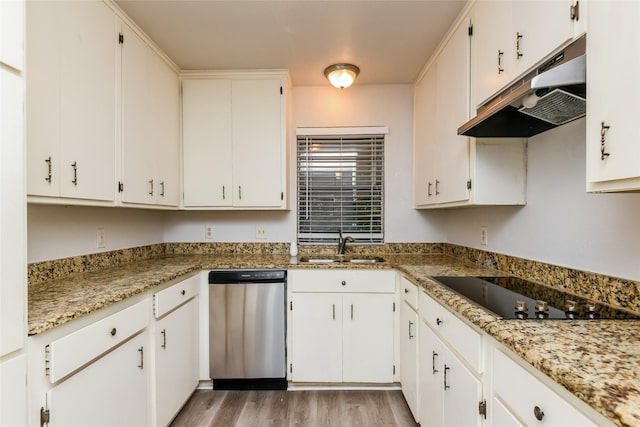 5304 Weddington Ct, Fort Worth, TX 76133 - kitchen with stainless steel dishwasher, under cabinet range hood, black electric stovetop, a sink, and light wood-style flooring