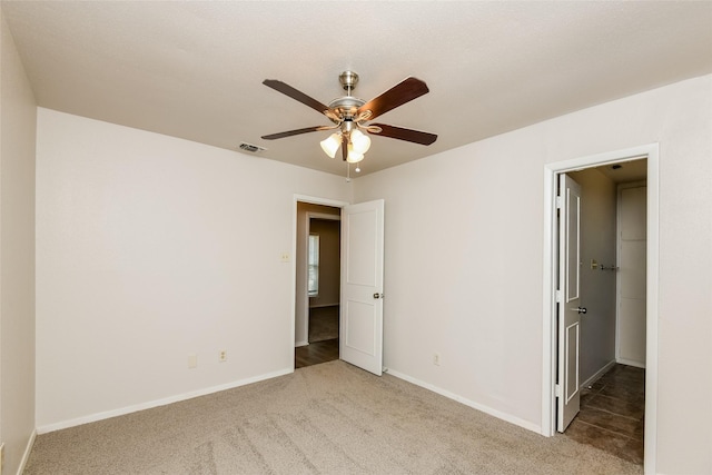 5304 Weddington Ct, Fort Worth, TX 76133 - unfurnished bedroom featuring carpet flooring, baseboards, and a ceiling fan