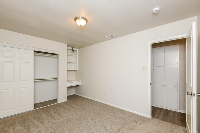 5304 Weddington Ct, Fort Worth, TX 76133 - unfurnished bedroom featuring carpet flooring, a closet, and baseboards
