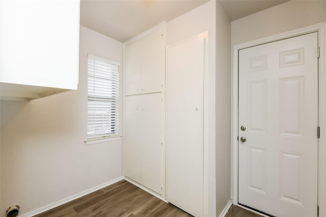 5304 Weddington Ct, Fort Worth, TX 76133 - clothes washing area featuring wood finished floors and baseboards