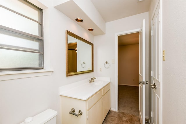 5304 Weddington Ct, Fort Worth, TX 76133 - half bathroom with toilet, vanity, and baseboards