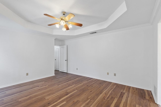 208 N Rustic Trl, Wylie, TX 75098 - empty room featuring ceiling fan, a raised ceiling, wood finished floors, and baseboards