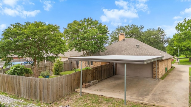 208 N Rustic Trl, Wylie, TX 75098 - rear view of house featuring fence, a chimney, a shingled roof, brick siding, and an attached garage