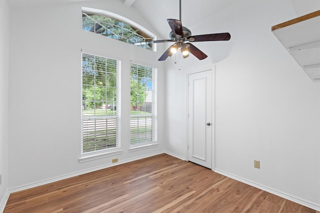 208 N Rustic Trl, Wylie, TX 75098 - unfurnished bedroom featuring light wood-style flooring, lofted ceiling, baseboards, and ceiling fan