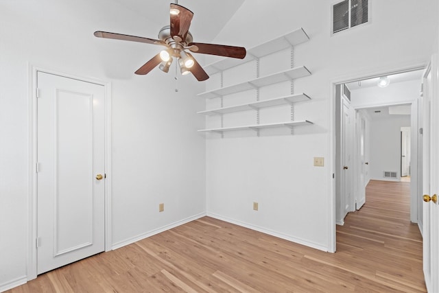 208 N Rustic Trl, Wylie, TX 75098 - spare room featuring ceiling fan, light wood-style flooring, and baseboards