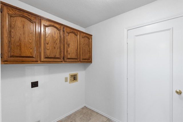 208 N Rustic Trl, Wylie, TX 75098 - laundry area with cabinet space, washer hookup, hookup for an electric dryer, and baseboards