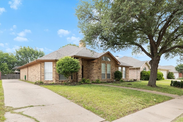 208 N Rustic Trl, Wylie, TX 75098 - view of front of property with concrete driveway, brick siding, and a chimney