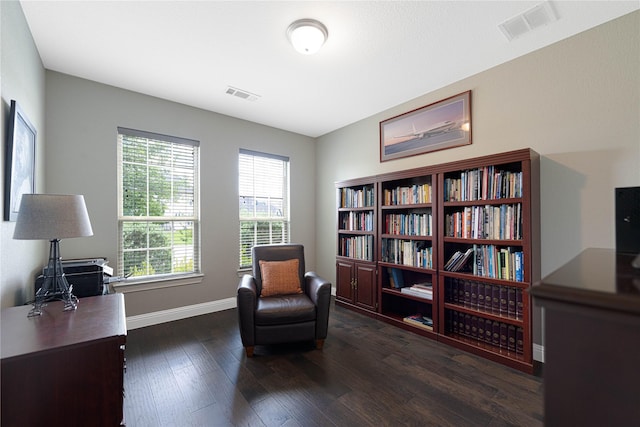 331 Sagemeadow Rd, Wylie, TX 75098 - living area featuring dark wood finished floors, baseboards, and a desk