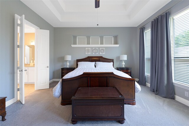 331 Sagemeadow Rd, Wylie, TX 75098 - carpeted bedroom featuring a raised ceiling, multiple windows, baseboards, and ceiling fan