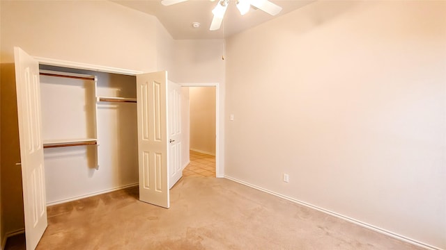 10252 Red Bluff Ln, Fort Worth, TX 76177 - unfurnished bedroom with light colored carpet, a closet, lofted ceiling, and a ceiling fan