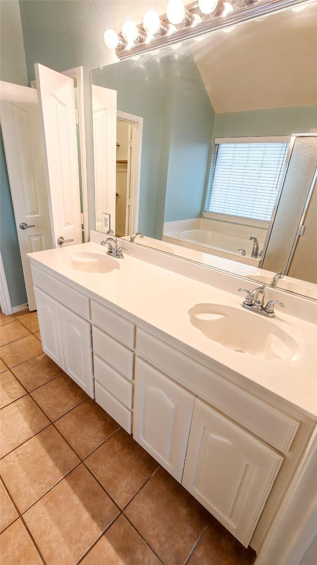 10252 Red Bluff Ln, Fort Worth, TX 76177 - full bathroom featuring tile patterned flooring, double vanity, and a bath