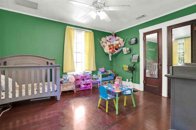 820 W Gandy St, Denison, TX 75020 - bedroom featuring wood finished floors, crown molding, and ceiling fan