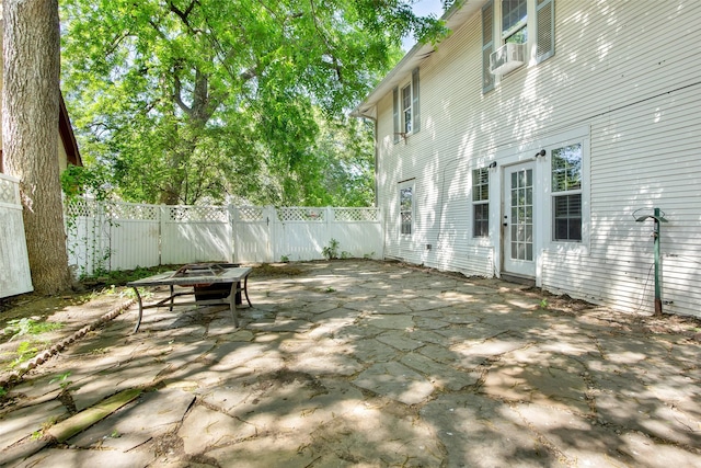 820 W Gandy St, Denison, TX 75020 - view of patio featuring fence and cooling unit