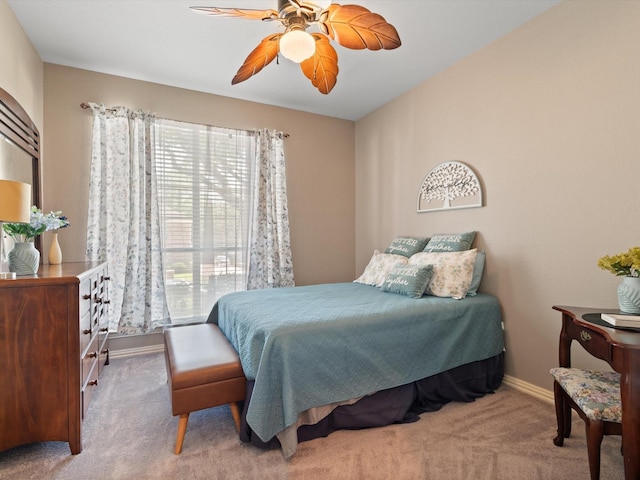 2105 Indian Trl, Rowlett, TX 75088 - carpeted bedroom with baseboards and ceiling fan