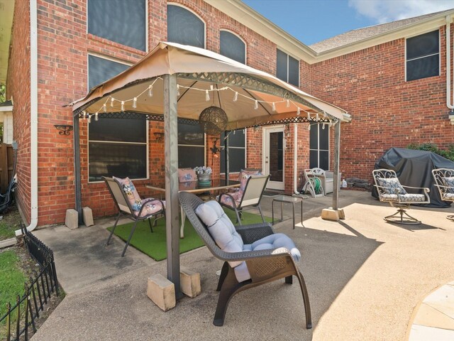 2105 Indian Trl, Rowlett, TX 75088 - view of patio with area for grilling and outdoor dining area