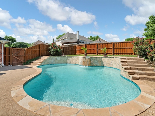 2105 Indian Trl, Rowlett, TX 75088 - view of swimming pool with a fenced backyard