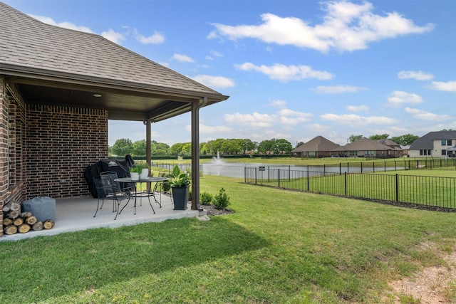 1037 Mickelson Dr, Granbury, TX 76048 - view of yard with a water view and a patio area