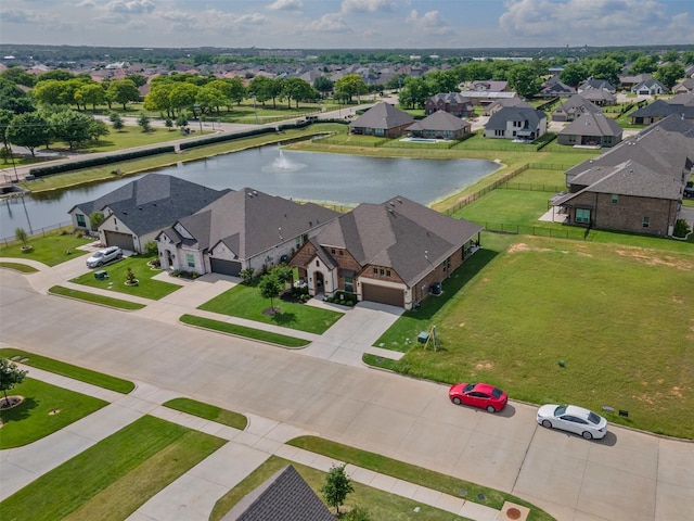 1037 Mickelson Dr, Granbury, TX 76048 - aerial perspective of suburban area with a nearby body of water