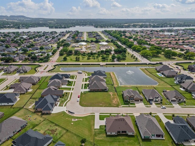 1037 Mickelson Dr, Granbury, TX 76048 - aerial view of property and surrounding area featuring a large body of water and nearby suburban area