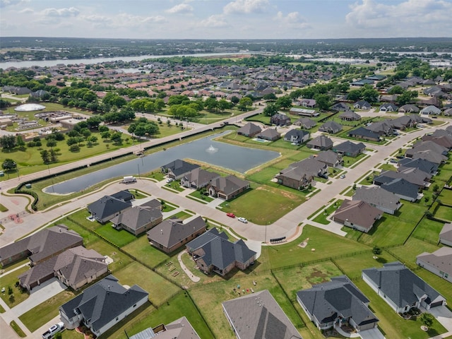 1037 Mickelson Dr, Granbury, TX 76048 - aerial view of property and surrounding area with a large body of water and nearby suburban area