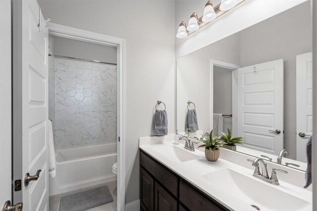 1037 Mickelson Dr, Granbury, TX 76048 - full bath with double vanity, toilet, shower / bathtub combination, and tile patterned floors