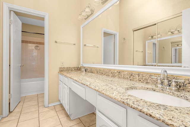 14333 Preston Rd Unit 2403, Dallas, TX 75254 - bathroom featuring tile patterned flooring and double vanity