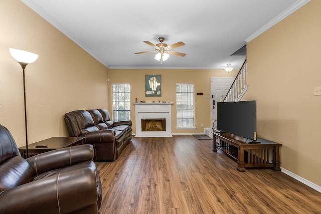 14333 Preston Rd Unit 2403, Dallas, TX 75254 - living area featuring wood finished floors, ceiling fan, baseboards, crown molding, and stairway