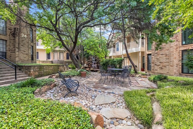 14333 Preston Rd Unit 2403, Dallas, TX 75254 - view of yard with a patio area and stairway