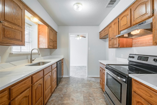 416 Birchwood Ln, Fort Worth, TX 76108 - kitchen featuring electric stove, under cabinet range hood, a sink, dishwashing machine, and brown cabinetry