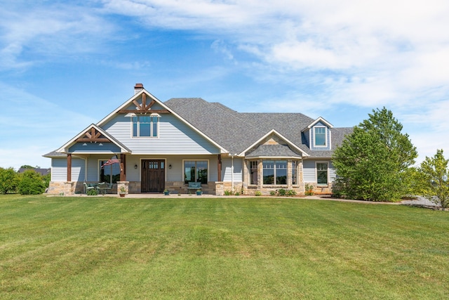 1206 Jc Maples Rd, Gunter, TX 75058 - craftsman-style home featuring a front lawn and stone siding