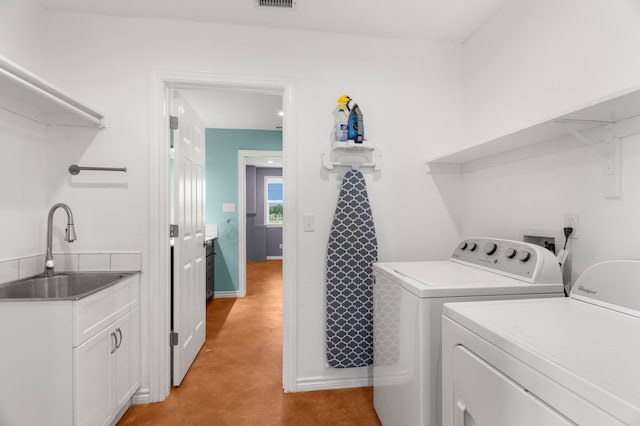 1206 Jc Maples Rd, Gunter, TX 75058 - washroom with washer and clothes dryer and a sink