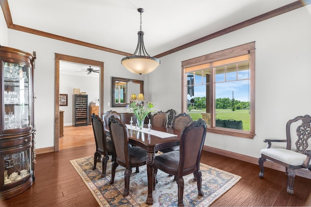 1206 Jc Maples Rd, Gunter, TX 75058 - dining area with baseboards, plenty of natural light, dark wood finished floors, ornamental molding, and a ceiling fan