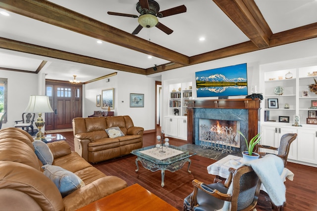 1206 Jc Maples Rd, Gunter, TX 75058 - living room featuring built in shelves, a high end fireplace, dark wood-style floors, ceiling fan, and beamed ceiling