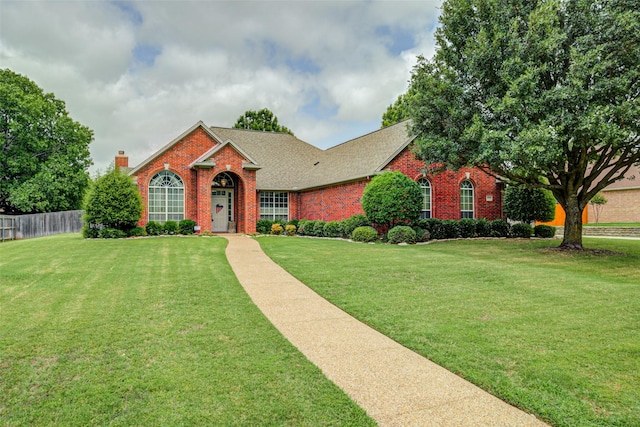 1016 S Hollow Dr, Southlake, TX 76092 - view of front of home featuring brick siding, a chimney, and a shingled roof
