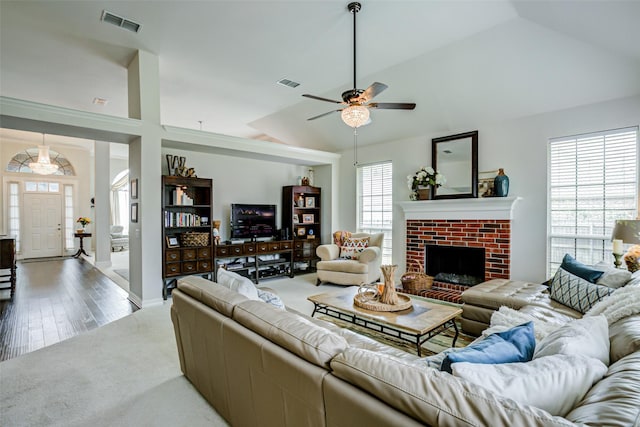1016 S Hollow Dr, Southlake, TX 76092 - living area featuring healthy amount of natural light, ceiling fan, carpet flooring, a fireplace, and lofted ceiling