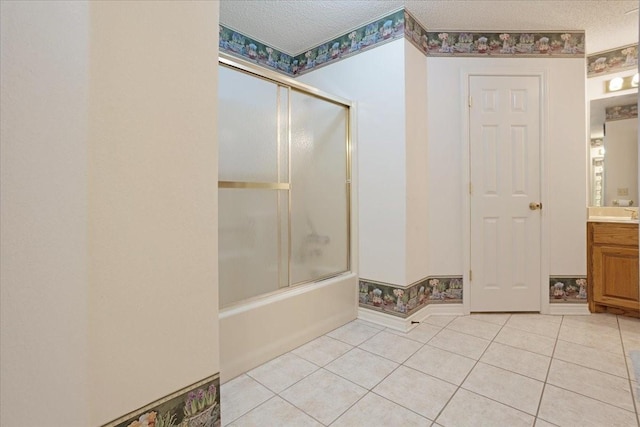 607 Dogwood Cir, Powderly, TX 75473 - bathroom featuring tile patterned flooring, vanity, shower / bath combination with glass door, and a textured ceiling