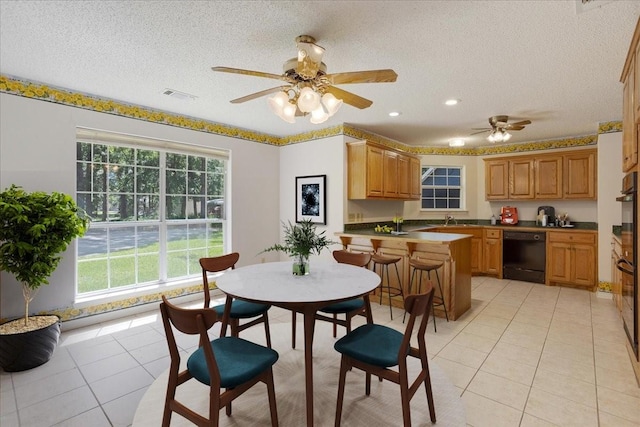 607 Dogwood Cir, Powderly, TX 75473 - dining area featuring plenty of natural light, light tile patterned floors, a textured ceiling, a ceiling fan, and recessed lighting