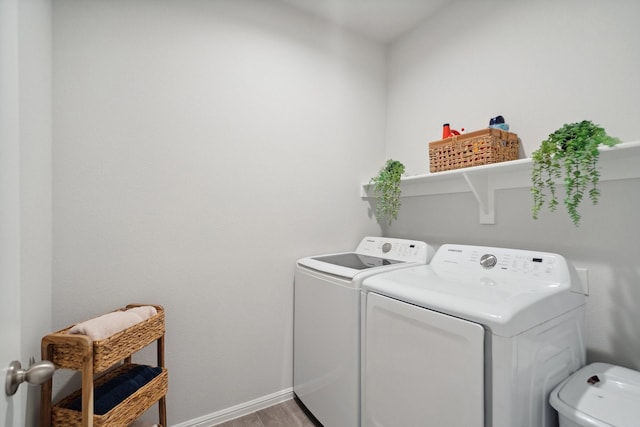 8580 Big Apple Dr, Fort Worth, TX 76179 - laundry area featuring washer and clothes dryer, baseboards, and light wood-type flooring