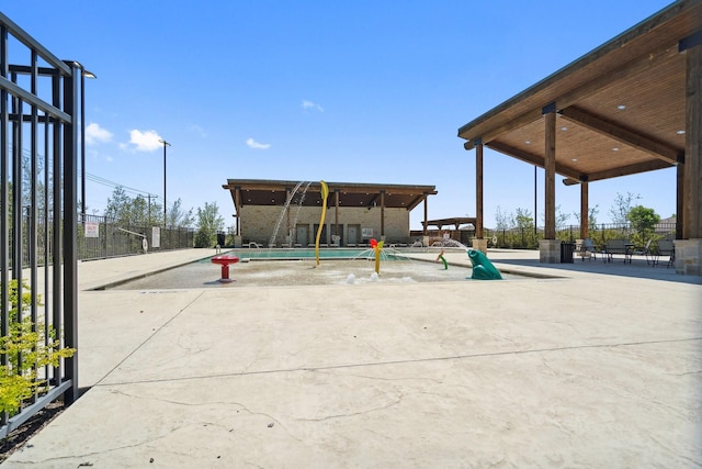8580 Big Apple Dr, Fort Worth, TX 76179 - view of community with fence and a patio area